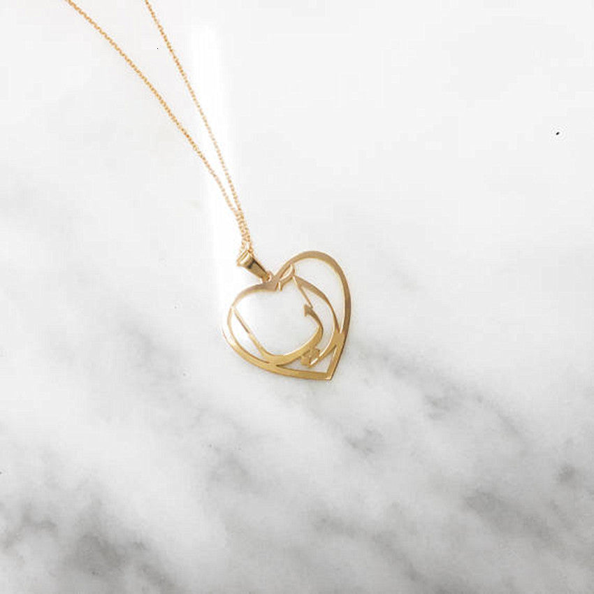 Golden Radiance: Crystal Heart Pendant Necklace